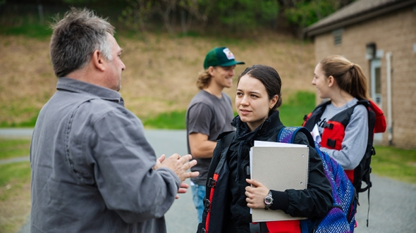 Anthropology student Anela Arifi ’20 talks with Kevin Maclean manager of the Hanover Wastewater Treatment Facility, during a stop on a class canoe trip on the Connecticut River. 